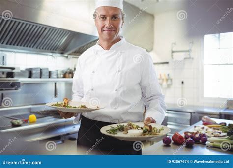 Chef Presenting His Food Plates Stock Photo Image Of Holding Chef