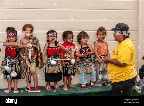 A small group of Maori children dressed in their traditional dance ...