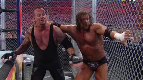 Picture Of The Undertaker Vs Triple H Hell In A Cell Match With Shawn