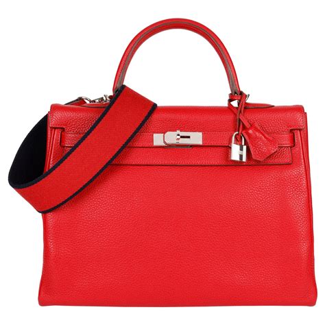 Sac à bandoulière sellier Kelly 25 rouge vif rouge à lèvres estampillé