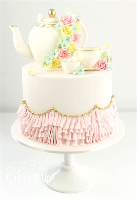 Elegant Tea Pot And Tea Cup Cake With Ruffled Tablecloth