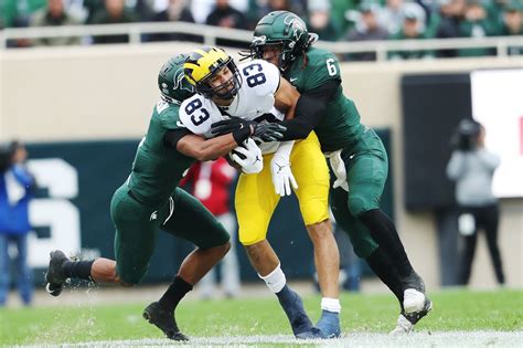 Michigan Moves Ahead Of Michigan State In New College Football Playoff