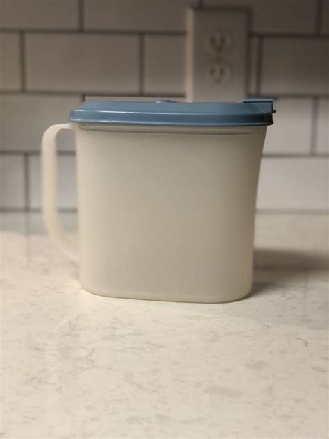 Vintage Tupperware Sheer Pitcher With Blue Lid A Quart Ebay