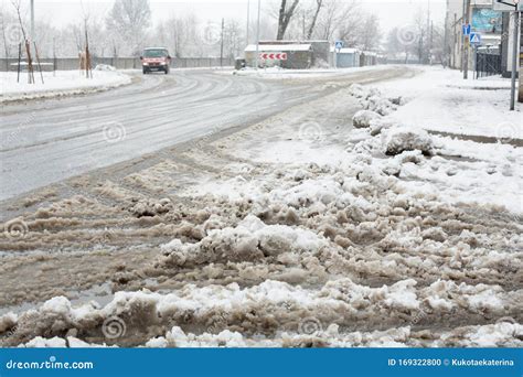 Slush, Snow Mixed with Mud on the Road. the Road is Not Cleared of Snow ...