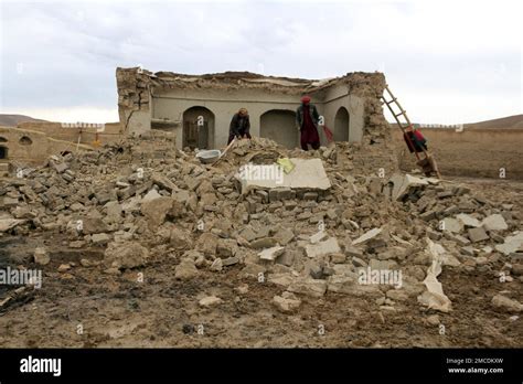 Afghan Villagers Remove Bricks After Their Home Was Damaged By Monday S