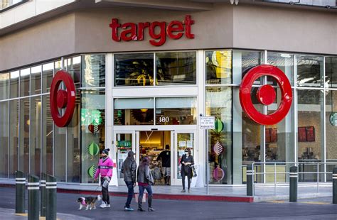 Pedestrians Walk By A Target Store In The Showcase Mall Building Where