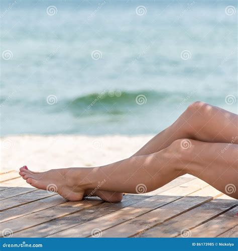 Woman S Beautiful Legs On The Beach Stock Image Image Of Beautiful