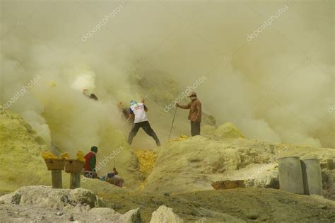 Workers mining sulfur inside volcano Ijen Stock Photo by ©BastianLinder ...