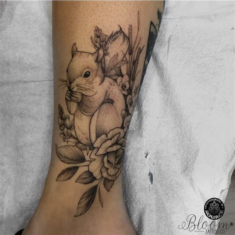 From Sketch To Skin: Captivating Squirrel Tattoo Designs For Your