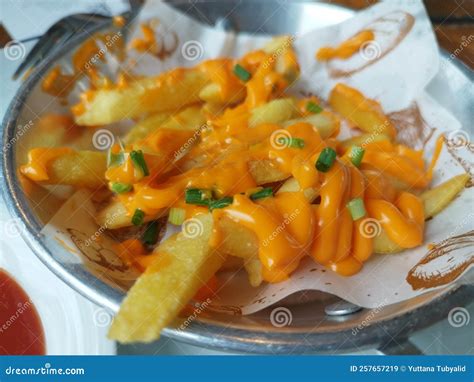 French Fries with Cheese Sauce Stock Image - Image of cheese, french ...