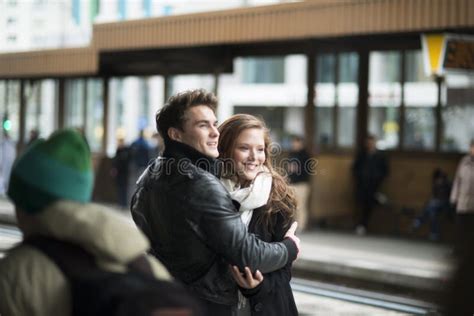 Young Business Couple Walking Through City Park Together Stock Image