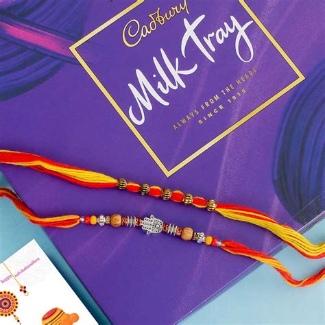 Send Rudraksha Rakhi Set With Cadbury Box Online Rakhibazaar