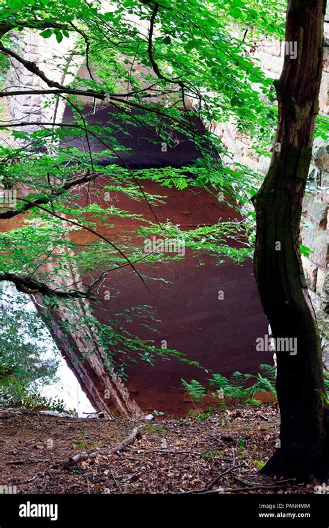 River Derwent flowing under bridge in the Upper Derwent Valley in the ...