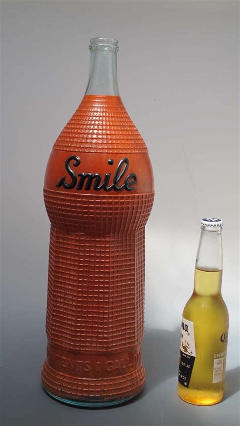 Smile Oversized Soda Fountain Bottle Advertising Orange Syrup At