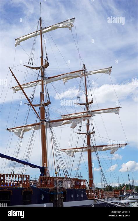 tall ship mast  rolled sails stock photo alamy