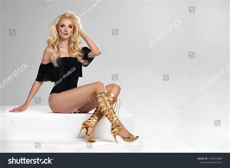 Sexy Blonde Woman Gold Shoes Stock Photo 1259673808 Shutterstock