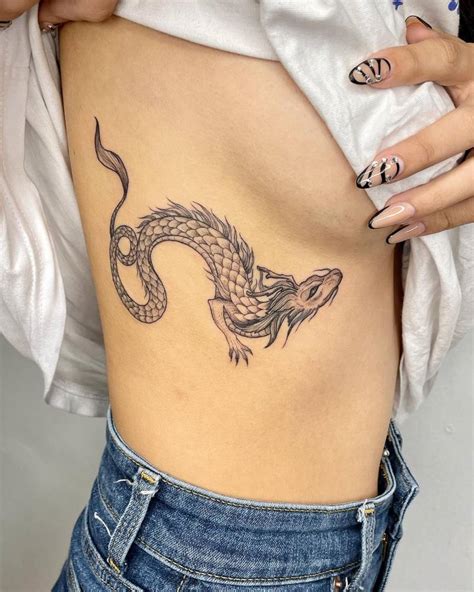 Dragon Tattoo Located On The Rib