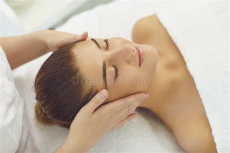 Smiling Womans Face Getting Professional Manual Relaxing Massage From