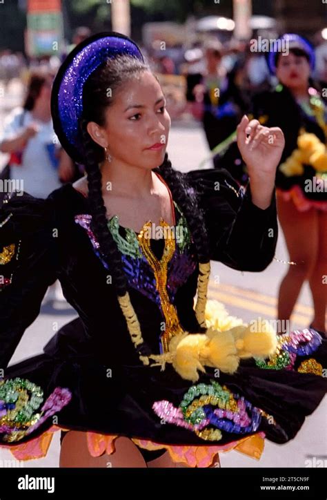 Dancer in traditional Bolivian dress at a street parade Stock Photo - Alamy