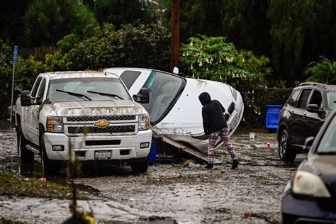 Flash Floods Inundate Homes And Overturn Cars In San Diego As Heavy