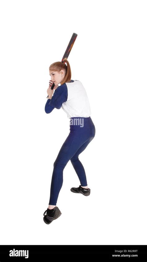 Woman Swinging Her Bat In Softball Stock Photo Alamy