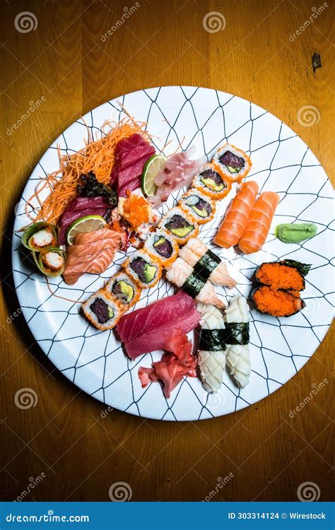 A Plate with Different Types of Sushi on it and One Piece Missing Stock Photo - Image of meal ...