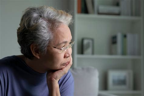 Premium Photo Portrait Of Sad And Lonely Asian Senior Woman In Living