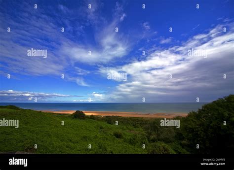 [Normandy American Cemetery and Memorial] beach Stock Photo - Alamy