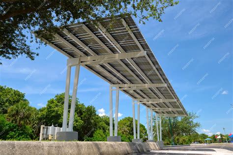 Premium Photo Solar Panels Installed As Shade Roof Over Parking Lot