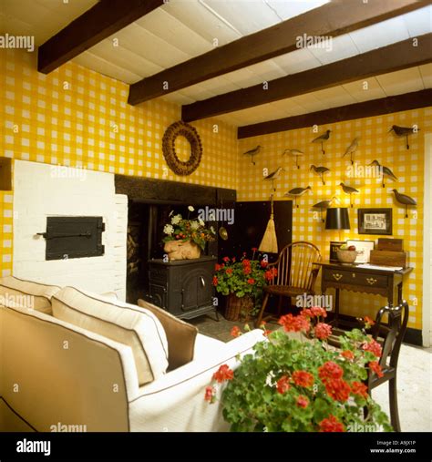 Yellow And White Checked Wallpaper In Country Sitting Room With