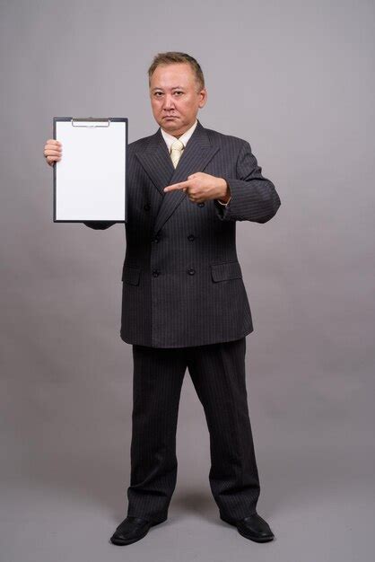 Premium Photo Portrait Of A Man Holding Camera