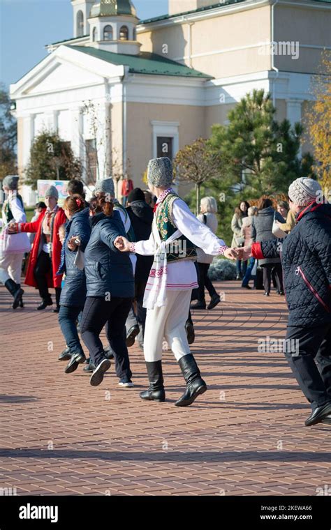 Bendery, Moldova - November 12, 2022: People dance Moldovan dance. Men ...