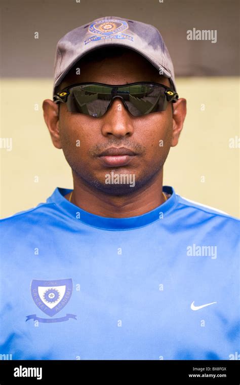 An Indian cricket coach at the National Cricket Academy in Bengaluru, India Stock Photo - Alamy