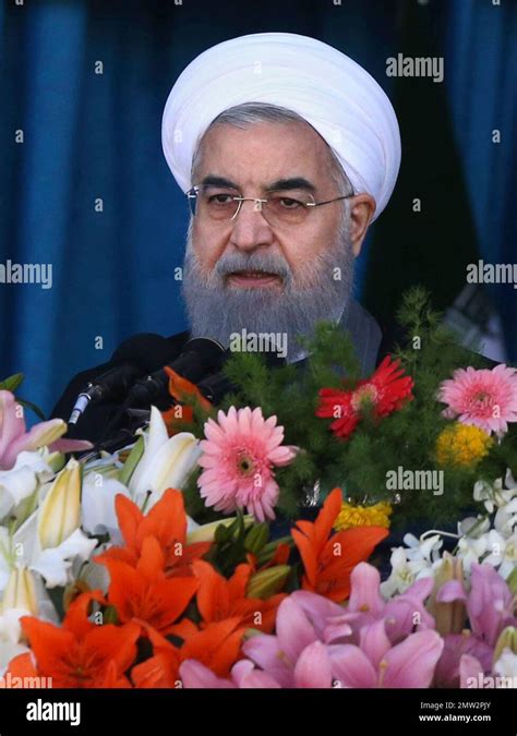 Iranian President Hassan Rouhani Speaks Before A Parade On National