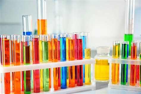 Different Test Tubes And Laboratory Glassware With Colorful Liquids On