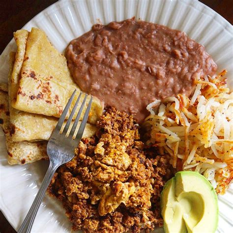 Homemade Chorizo With Eggs Hashbrowns And Refried Beans Recipe