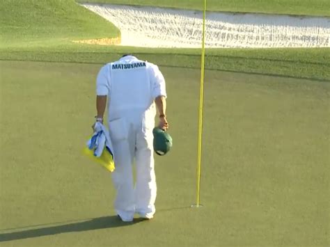 The Caddie For Masters Champ Hideki Matsuyama Bowed In Respect To