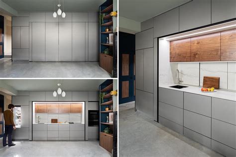 This Kitchen Was Designed To Hide Behind A Wall Of Minimalist Cabinets