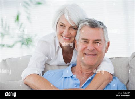 Portrait Of A Mature Woman Hugging Husband Stock Photo Alamy