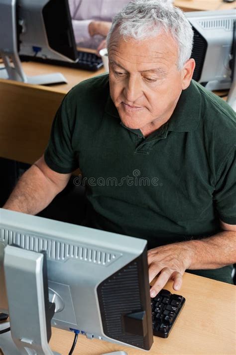 Senior Man Using Computer In Classroom Stock Image Image Of Classroom