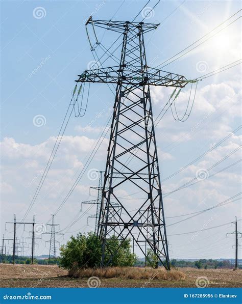 The Silhouette Of The Evening Electricity Transmission Pylon Power