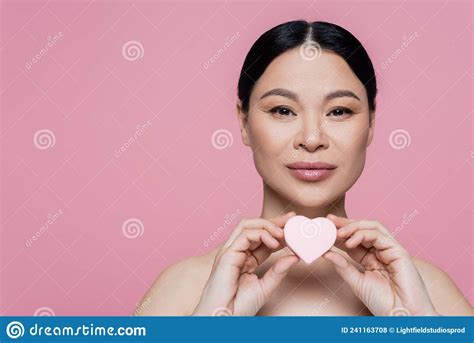 Asian Woman With Naked Shoulders Holding Stock Photo Image Of Makeup