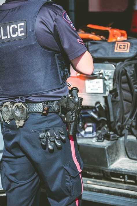 Picture Of The Back Of A Police Officer In Calgary Alberta Canada