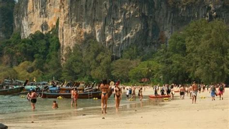 Two Bikini Girls Play Paddleboard On The Stock Video Pond5