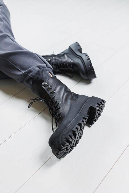 Premium Photo | Black leather boots on women's legs New collection of ...