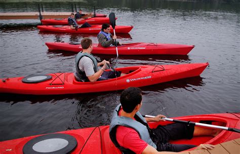 People In Red Canoes Paddling Image Free Stock Photo Public Domain