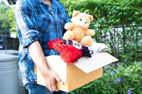 Premium Photo Midsection Of Woman Holding Teddy Bear