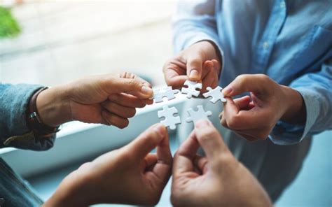 Premium Photo Closeup Image Of A Group Of People Holding And Putting