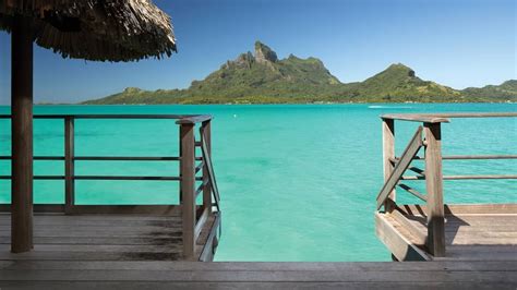 Mountain View Overwater Bungalow Deck Looking Out At Lagoon And Mount