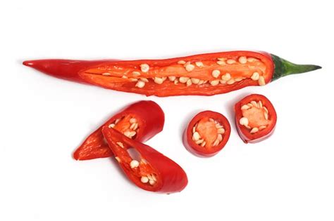 Premium Photo Half Sliced Red Hot Chili Pepper Top View Isolated On White Background Clipping Path